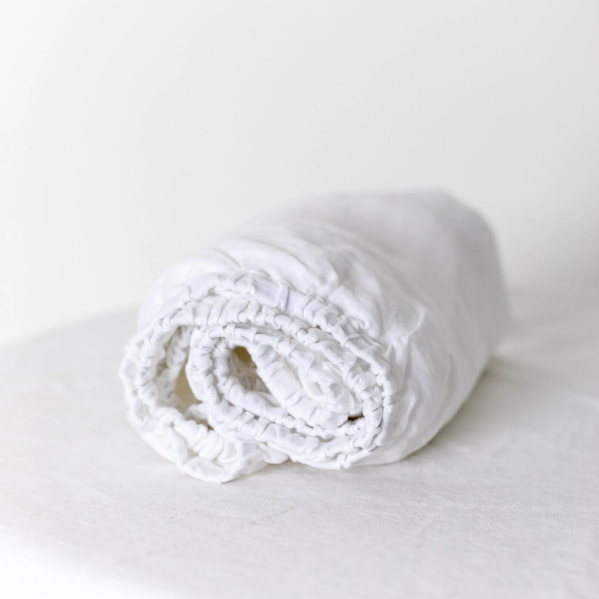 Brilliant White Linen Cot/Bassinet Sheet - Image 5